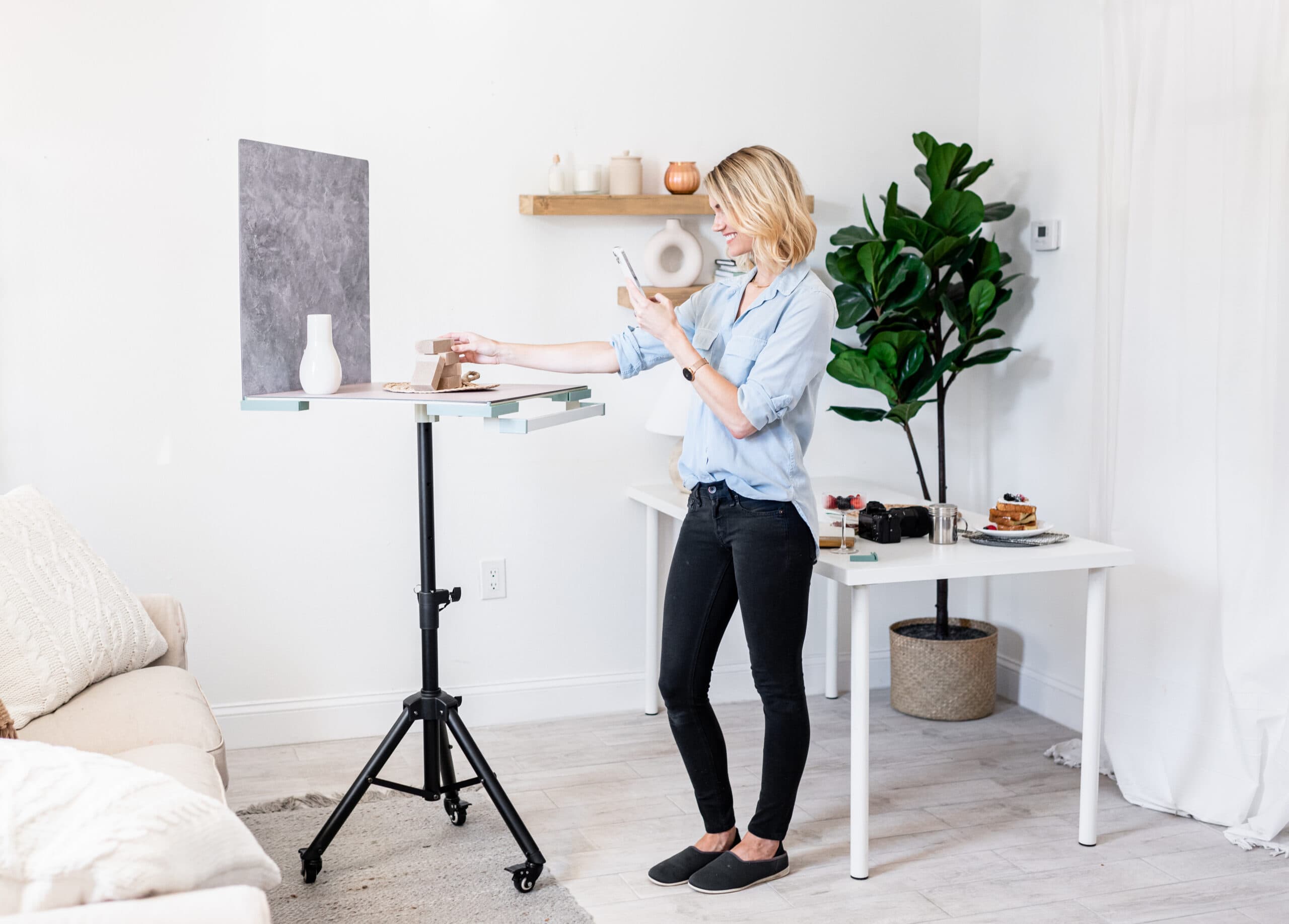 Replica Surfaces founder shooting product photos in her studio